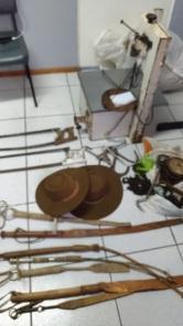 Prisão em Cruz Alta: crime de posse ilegal de arma de fogo e receptação.